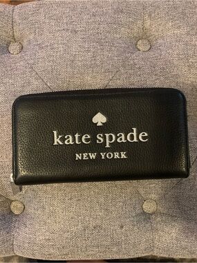 kate spade Black Pebbled Leather Zip Around Wallet with Silver Logo